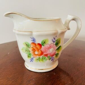 Vintage Japanese porcelain creamer pitcher with hand-painted floral design